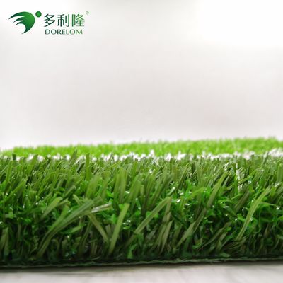 フットボール競技場のための緑色で長持ちする草草