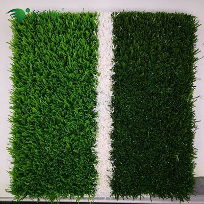 フットボール競技場のための緑色で長持ちする草草