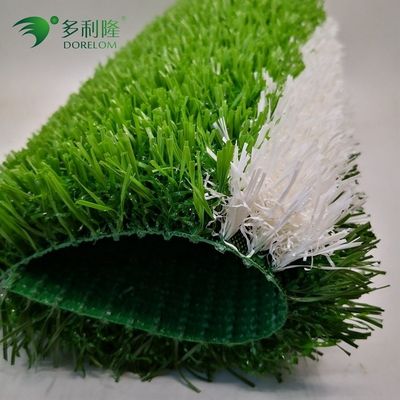フットボール競技場のための緑色で長持ちする草草