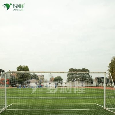 フットボール競技場のための緑色で長持ちする草草